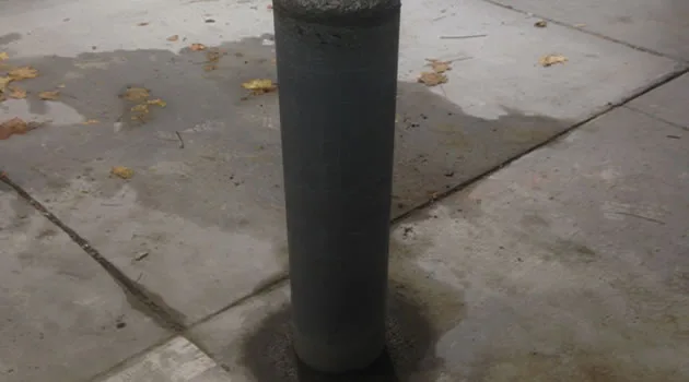 Installed bollards guarding a building approach